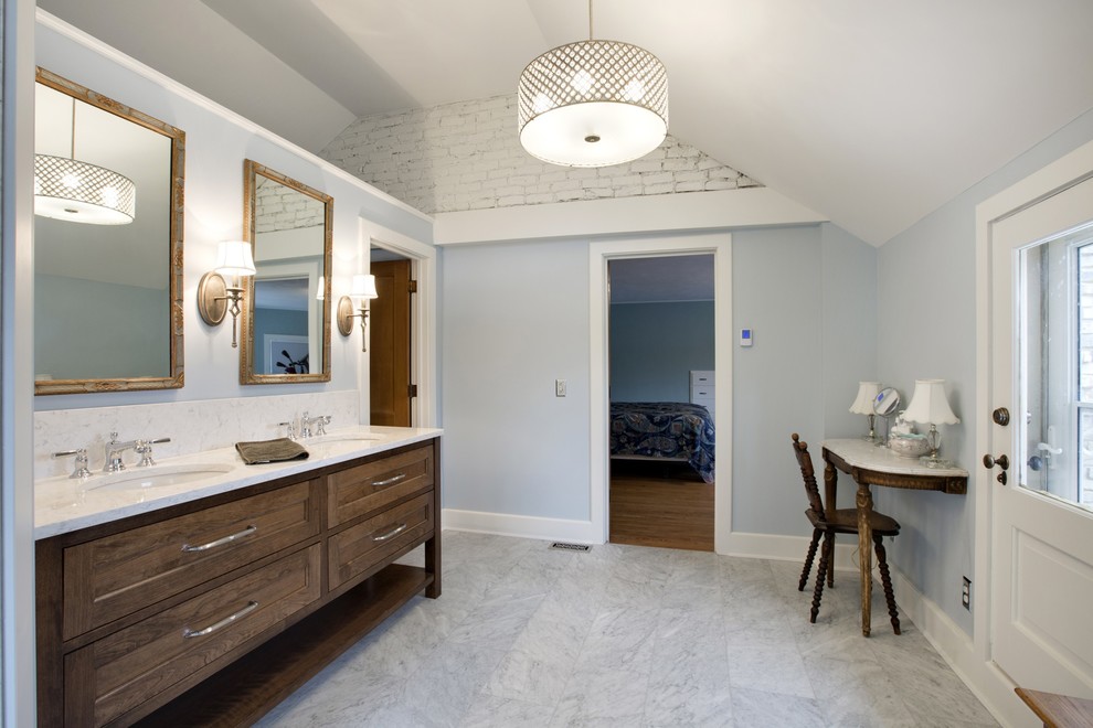 Large traditional ensuite wet room bathroom in Minneapolis with shaker cabinets, dark wood cabinets, a one-piece toilet, white tiles, stone tiles, blue walls, marble flooring, a submerged sink and engineered stone worktops.