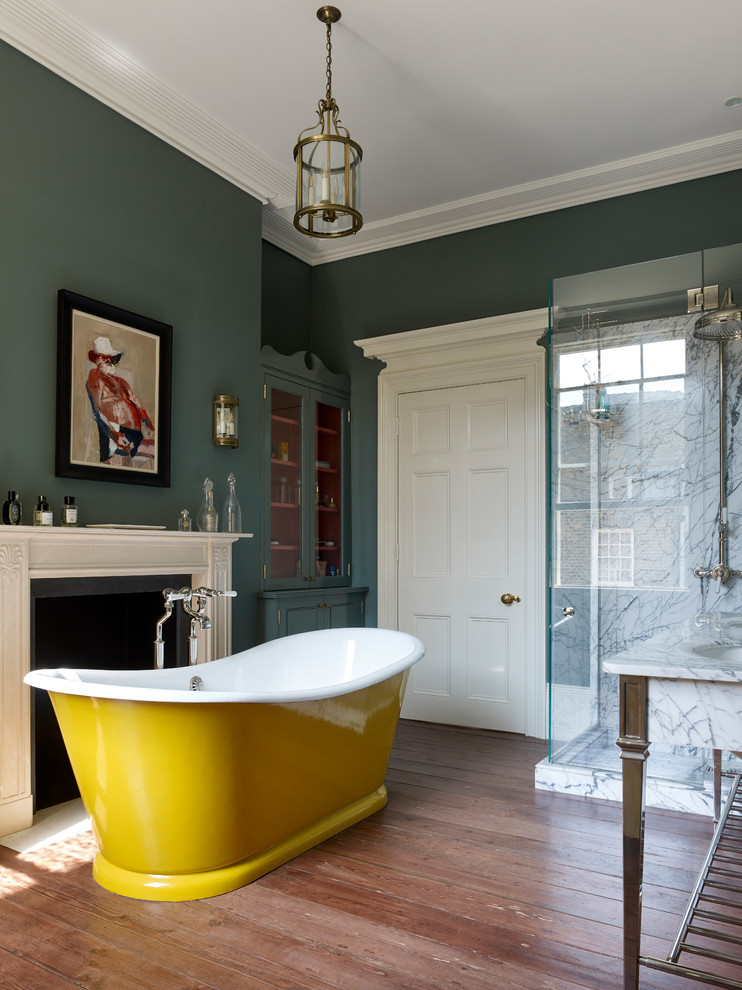 Design ideas for a victorian bathroom in London with a chimney breast.