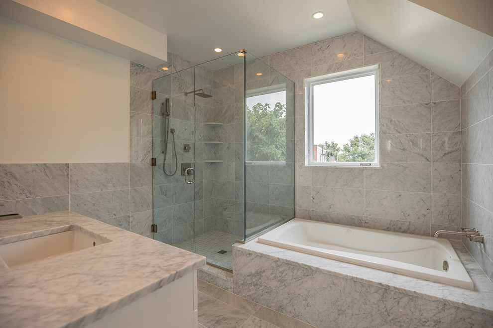 Inspiration for a large modern master gray tile and marble tile marble floor and white floor bathroom remodel in Philadelphia with flat-panel cabinets, white cabinets, gray walls, an undermount sink, marble countertops and a hinged shower door