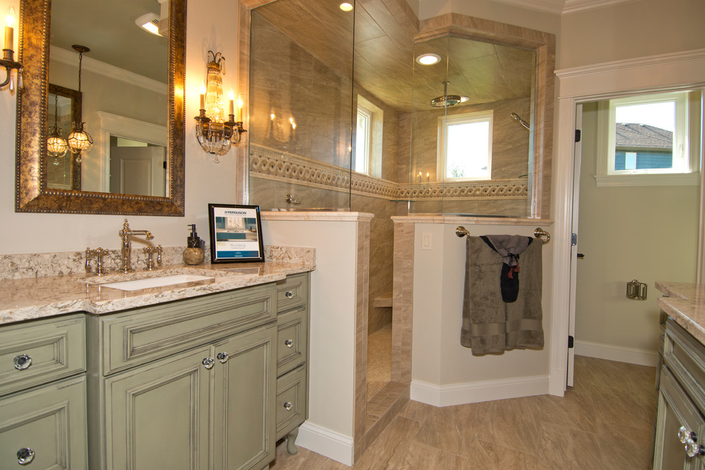Inspiration for a mid-sized traditional master bathroom in Other with an undermount sink, furniture-like cabinets, green cabinets, granite benchtops, a double shower, a one-piece toilet, beige tile, porcelain tile, beige walls and porcelain floors.