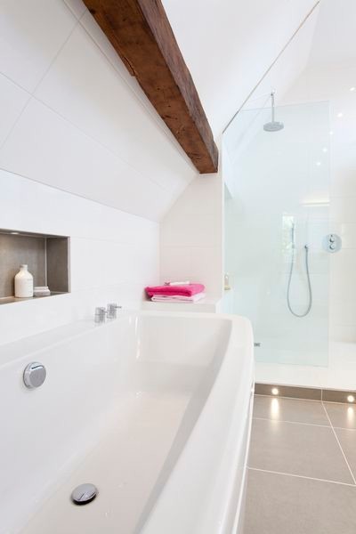Bathroom - large contemporary kids' gray tile and porcelain tile porcelain tile bathroom idea in Oxfordshire with a vessel sink, flat-panel cabinets, white cabinets, wood countertops, a one-piece toilet and white walls