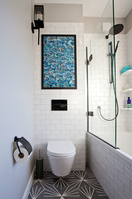 Family bathroom with matt black detailing and patterned tile floor ...