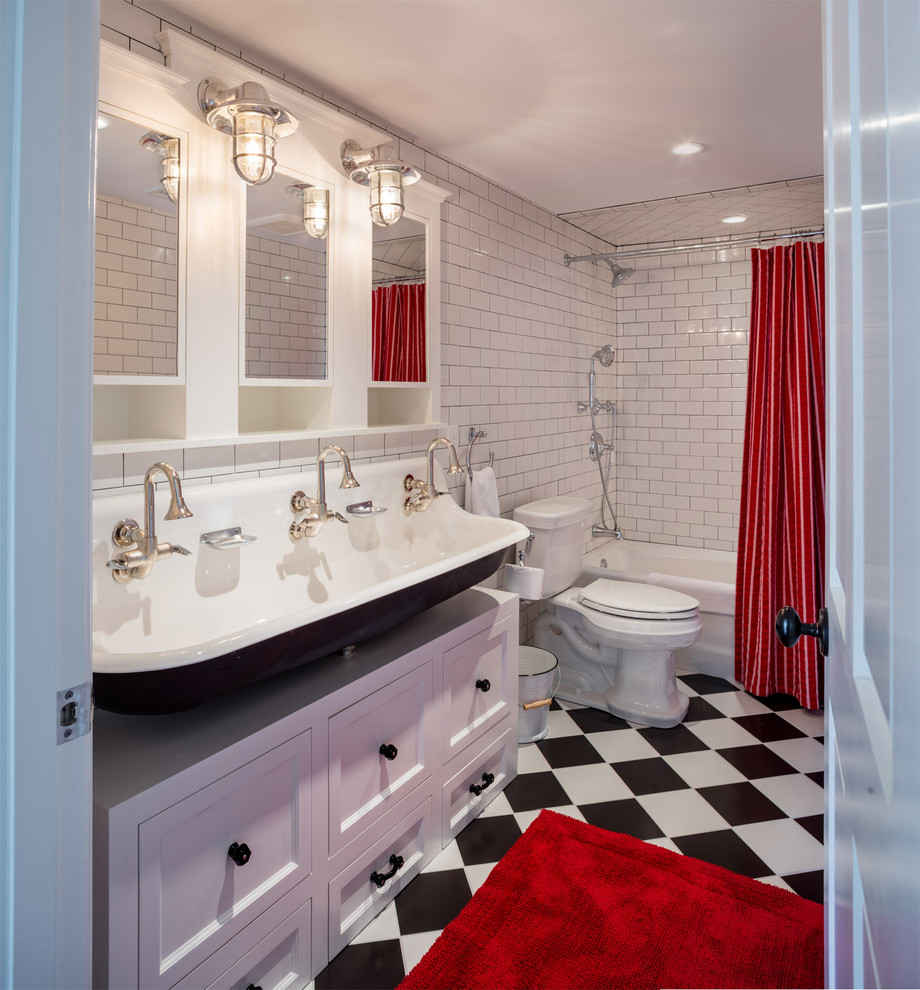 Country family bathroom in Providence with white cabinets, a built-in bath, white tiles, metro tiles, white walls, porcelain flooring and a trough sink.