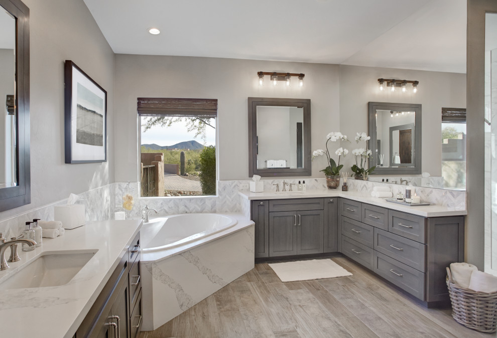 Large country master white tile and porcelain tile porcelain tile and gray floor bathroom photo in Phoenix with shaker cabinets, gray cabinets, gray walls, an undermount sink, quartz countertops and gray countertops