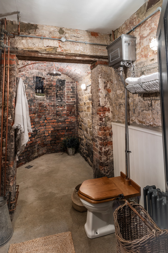 Inspiration for a small urban bathroom in Kent with concrete flooring, beige floors and an open shower.