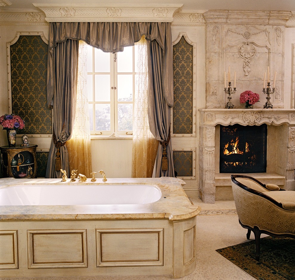 Design ideas for a classic bathroom in Los Angeles with a submerged bath and a chimney breast.