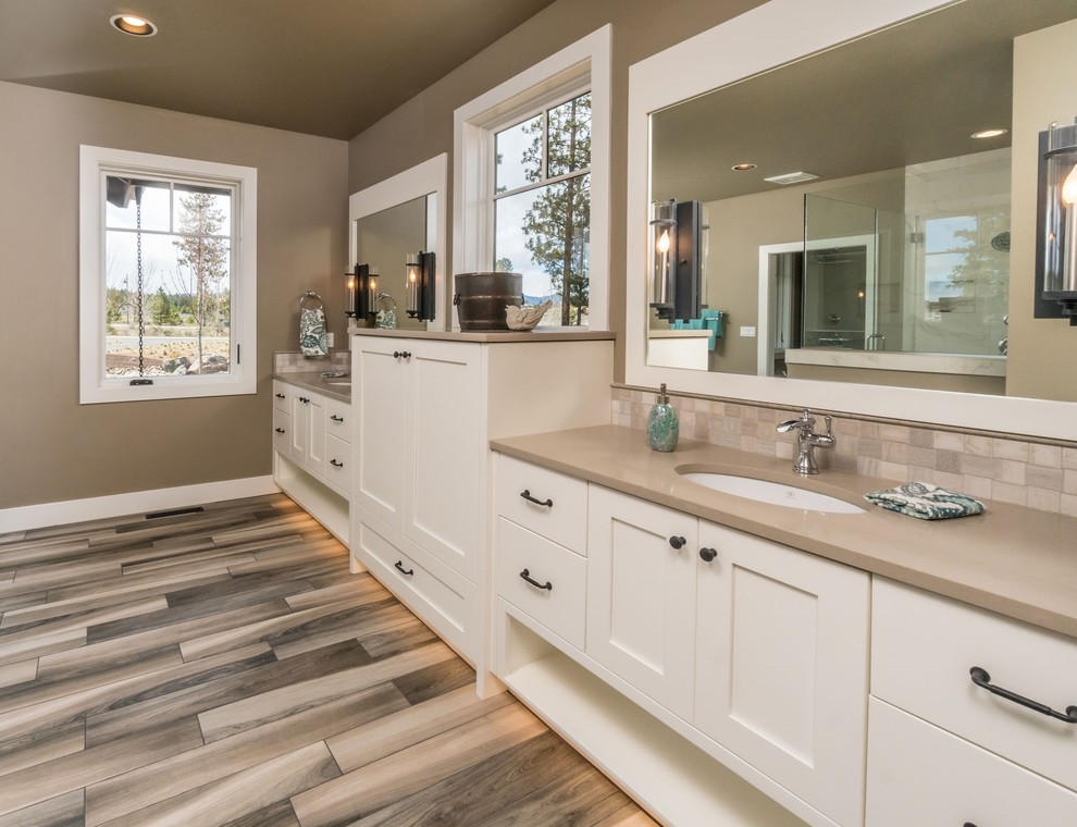 Bathroom - mid-sized cottage master porcelain tile and multicolored floor bathroom idea in Other with shaker cabinets, white cabinets, beige walls, an undermount sink and quartz countertops