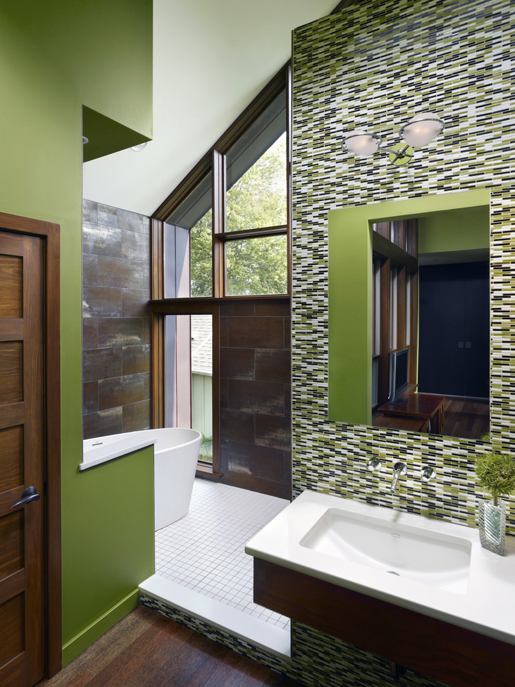 Cottage master multicolored tile and glass tile dark wood floor bathroom photo in Philadelphia with an undermount sink, flat-panel cabinets, medium tone wood cabinets, green walls and quartz countertops