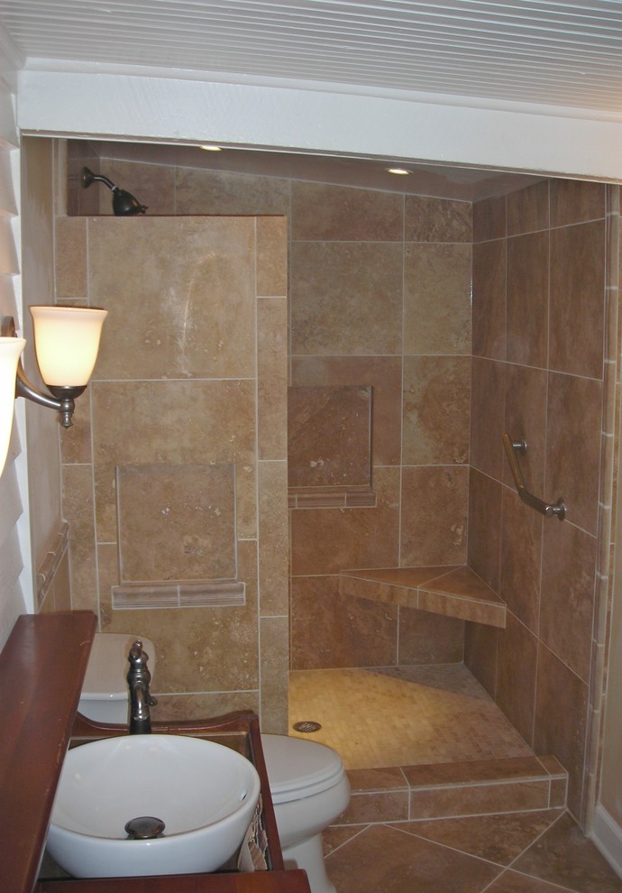 Inspiration for a country stone tile bathroom remodel in Other
