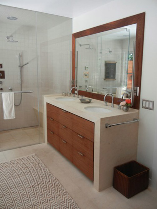 Large cottage master white tile and ceramic tile limestone floor and white floor bathroom photo in San Francisco with flat-panel cabinets, medium tone wood cabinets, white walls, an undermount sink, limestone countertops and a hinged shower door