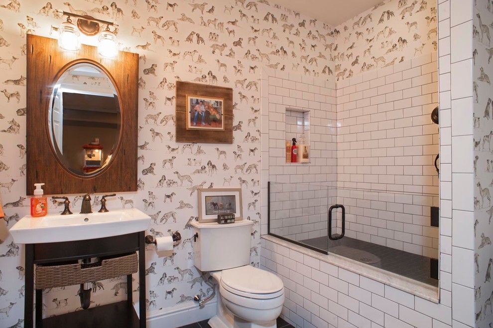 Small traditional bathroom in New York with an integrated sink, freestanding cabinets, dark wood cabinets, solid surface worktops, a walk-in shower, a two-piece toilet, white tiles, ceramic tiles and porcelain flooring.