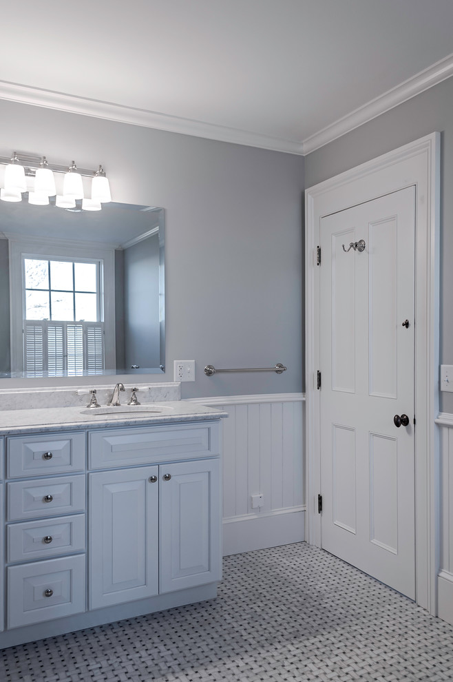 Example of a huge beach style master white tile and ceramic tile mosaic tile floor bathroom design in Providence with raised-panel cabinets, blue cabinets, quartz countertops, a two-piece toilet, gray walls and an undermount sink