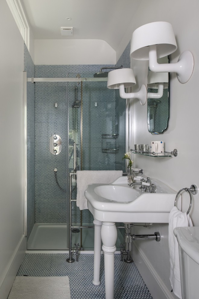 Photo of a small eclectic shower room bathroom in Hampshire with blue tiles, white tiles, white walls, a console sink, a sliding door, an alcove shower, mosaic tiles, mosaic tile flooring and multi-coloured floors.