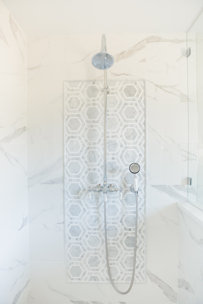 Inspiration for a mid-sized transitional master white tile and porcelain tile marble floor, white floor and double-sink corner shower remodel in Seattle with shaker cabinets, white cabinets, a one-piece toilet, gray walls, an undermount sink, marble countertops, a hinged shower door, white countertops and a built-in vanity