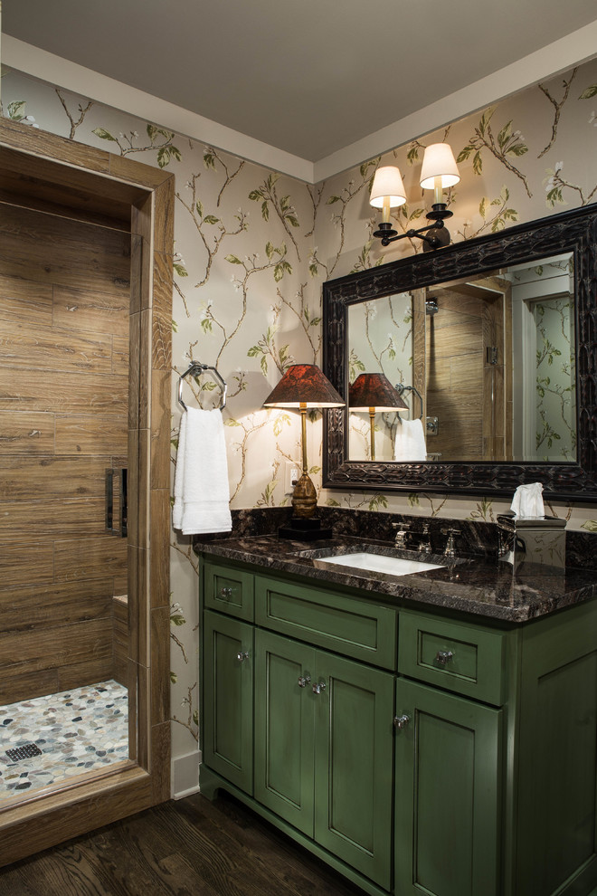 Example of a small classic mosaic tile and brown tile mosaic tile floor bathroom design in Atlanta with an undermount sink, recessed-panel cabinets, green cabinets, granite countertops, a one-piece toilet and multicolored walls