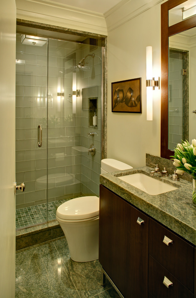 Mid-sized elegant master blue tile and subway tile marble floor alcove shower photo in New York with flat-panel cabinets, dark wood cabinets, a two-piece toilet, white walls, an undermount sink and granite countertops