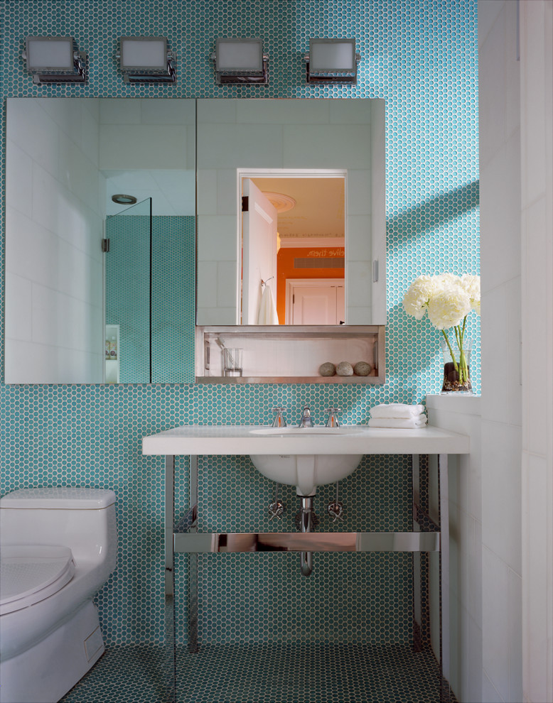 Example of a mid-sized minimalist kids' blue tile and glass tile porcelain tile alcove shower design in New York with a console sink, a one-piece toilet and multicolored walls