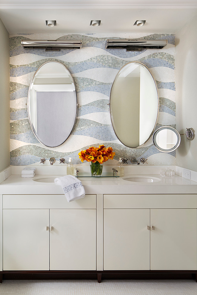 На фото: ванная комната в стиле неоклассика (современная классика) с врезной раковиной, мраморной столешницей, плоскими фасадами, разноцветной плиткой, плиткой мозаикой и бежевыми фасадами