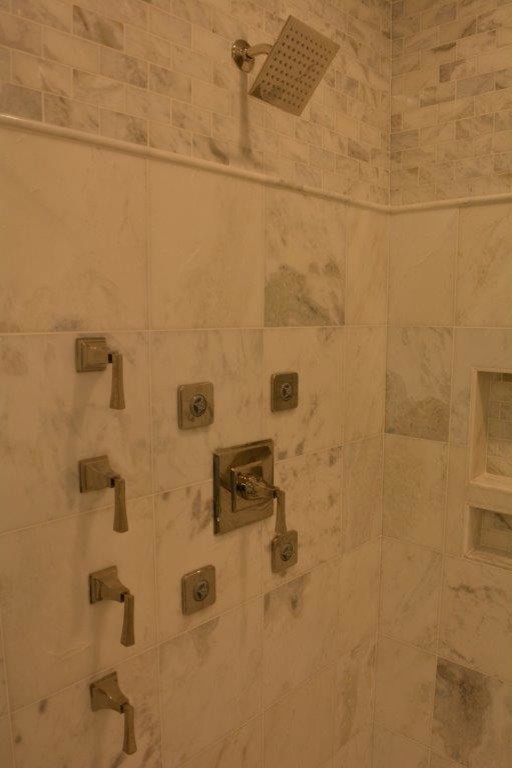 Large beach style master white tile and marble tile marble floor and white floor bathroom photo in Other with shaker cabinets, white cabinets, an undermount sink, marble countertops and a hinged shower door