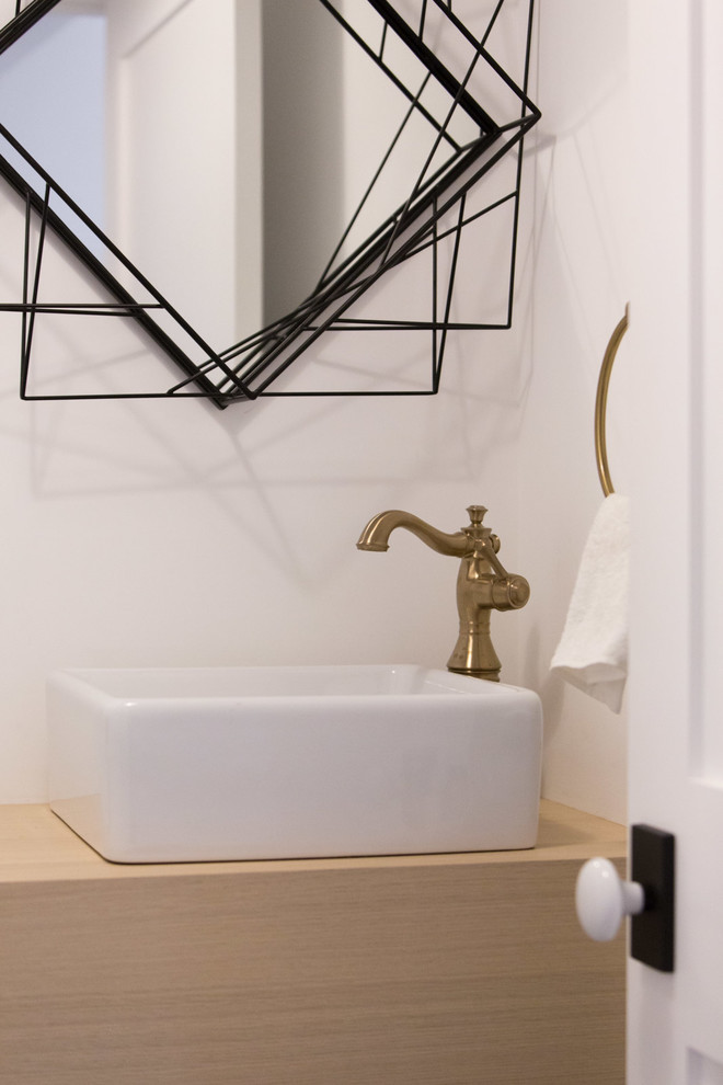 Example of a cottage 3/4 white tile bathroom design in Los Angeles with flat-panel cabinets, light wood cabinets and white walls