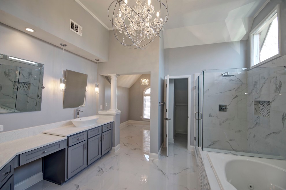 На фото: большая главная ванная комната в стиле неоклассика (современная классика) с фасадами в стиле шейкер, серыми фасадами, накладной ванной, угловым душем, серой плиткой, белой плиткой, керамической плиткой, серыми стенами, мраморным полом, настольной раковиной и столешницей из гранита