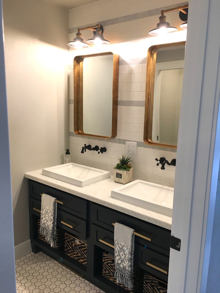 Design ideas for a large rural family bathroom in Other with open cabinets, black cabinets, a built-in bath, a shower/bath combination, a one-piece toilet, white tiles, metro tiles, grey walls, mosaic tile flooring, a trough sink, marble worktops, white floors and a shower curtain.