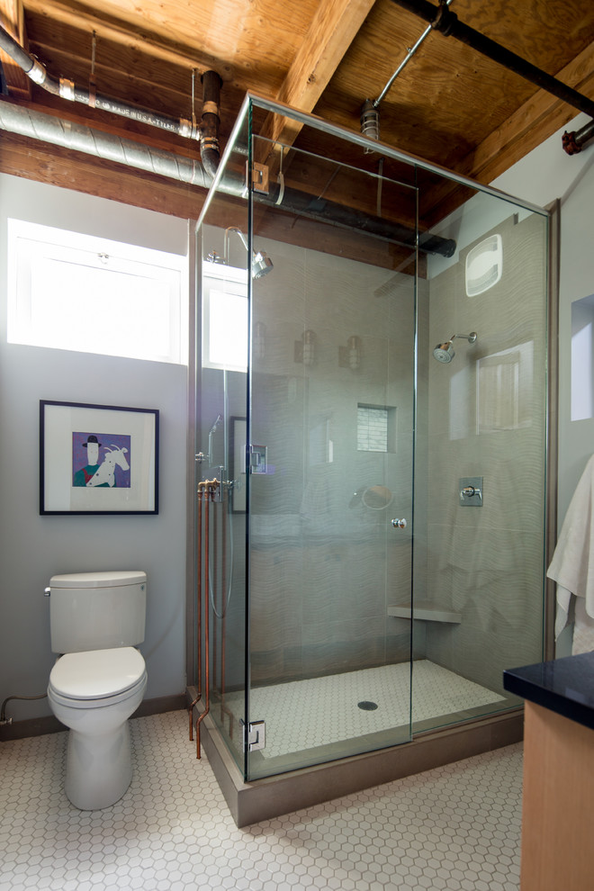 Example of a mid-sized urban master white tile and porcelain tile porcelain tile doorless shower design in Portland with an undermount sink, beaded inset cabinets, light wood cabinets, quartz countertops, a two-piece toilet and gray walls