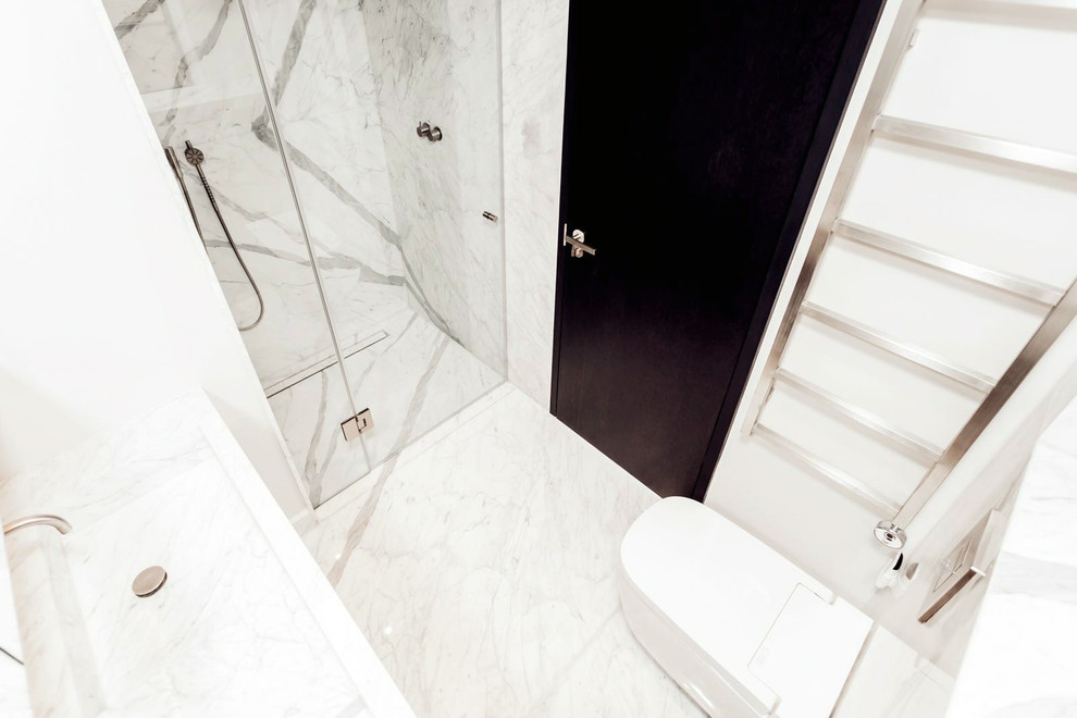 Example of a small trendy kids' black and white tile and marble tile marble floor walk-in shower design in London with flat-panel cabinets, dark wood cabinets, a one-piece toilet, white walls, a drop-in sink and marble countertops