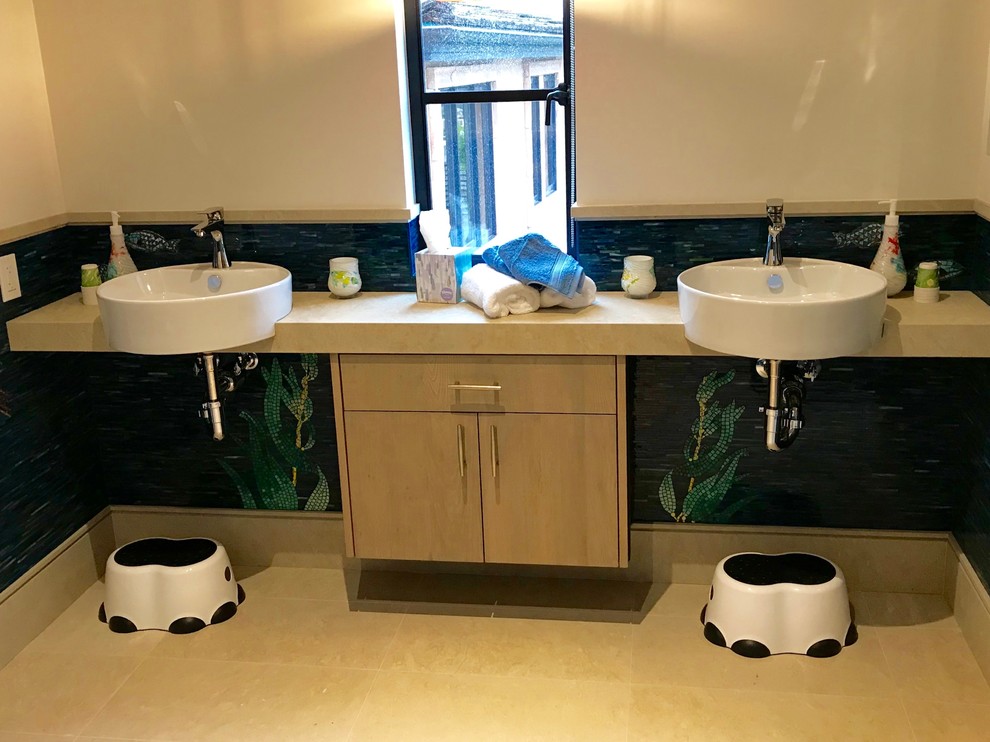 Example of a mid-sized trendy kids' bathroom design in Orange County with flat-panel cabinets, beige cabinets and granite countertops
