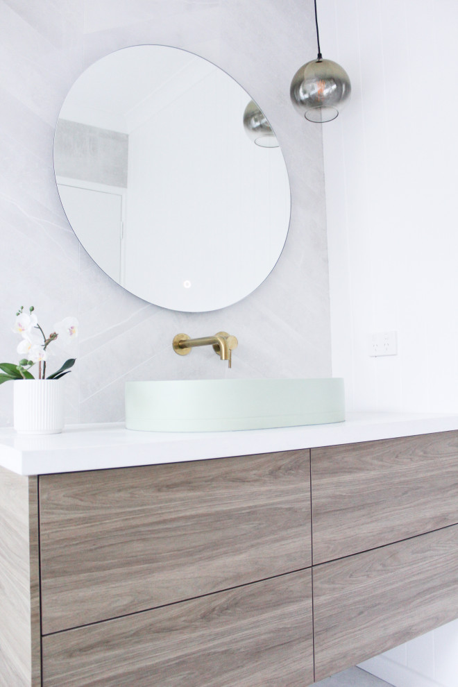 Bathroom - mid-sized modern kids' gray tile and porcelain tile porcelain tile, gray floor, single-sink and wall paneling bathroom idea in Perth with flat-panel cabinets, dark wood cabinets, gray walls, a vessel sink, quartz countertops, white countertops, a niche and a floating vanity