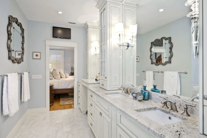 Bathroom - mid-sized contemporary 3/4 mosaic tile floor bathroom idea in Tampa with flat-panel cabinets, white cabinets, beige walls, an undermount sink and granite countertops