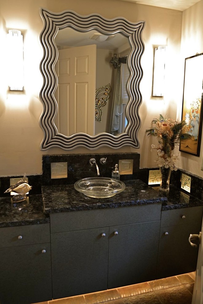 Example of a large island style 3/4 black tile and stone tile slate floor bathroom design in Miami with flat-panel cabinets, gray cabinets, granite countertops, a one-piece toilet, a vessel sink and beige walls
