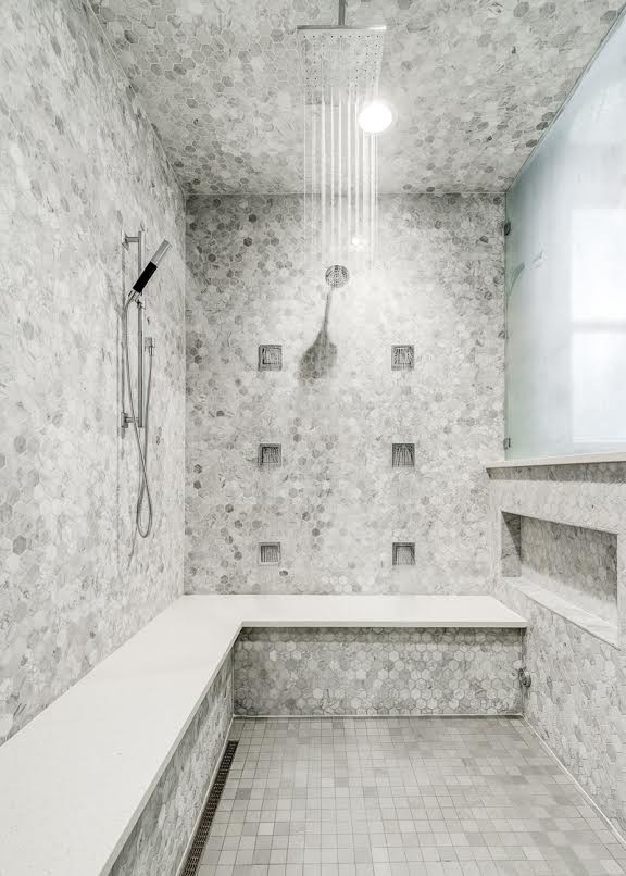Bathroom - large contemporary master gray tile and marble tile ceramic tile and gray floor bathroom idea in Dallas with raised-panel cabinets, dark wood cabinets, a two-piece toilet, gray walls, a vessel sink, solid surface countertops and a hinged shower door