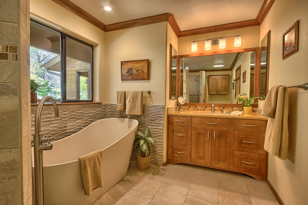 Mid-sized transitional master brown tile and porcelain tile porcelain tile bathroom photo in Other with an undermount sink, recessed-panel cabinets, medium tone wood cabinets, solid surface countertops, a two-piece toilet and yellow walls