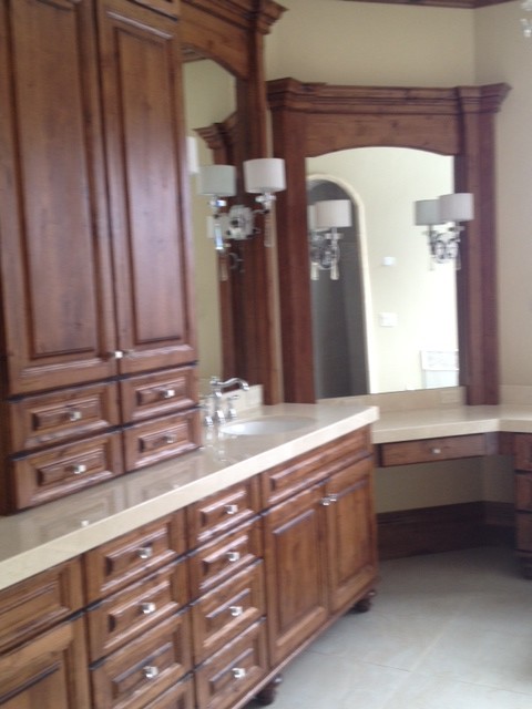 Bathroom - large traditional master bathroom idea in Salt Lake City with an undermount sink, raised-panel cabinets, medium tone wood cabinets and beige walls