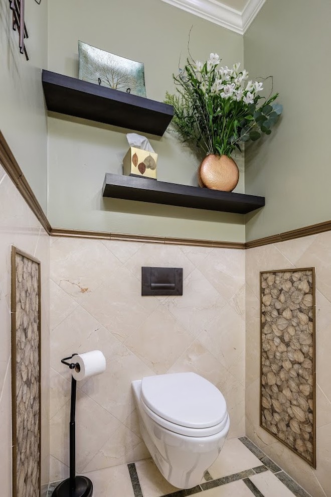 This is an example of a medium sized contemporary cloakroom in Sacramento with brown cabinets, a wall mounted toilet, beige tiles, ceramic tiles, beige walls, limestone flooring, a vessel sink and shaker cabinets.