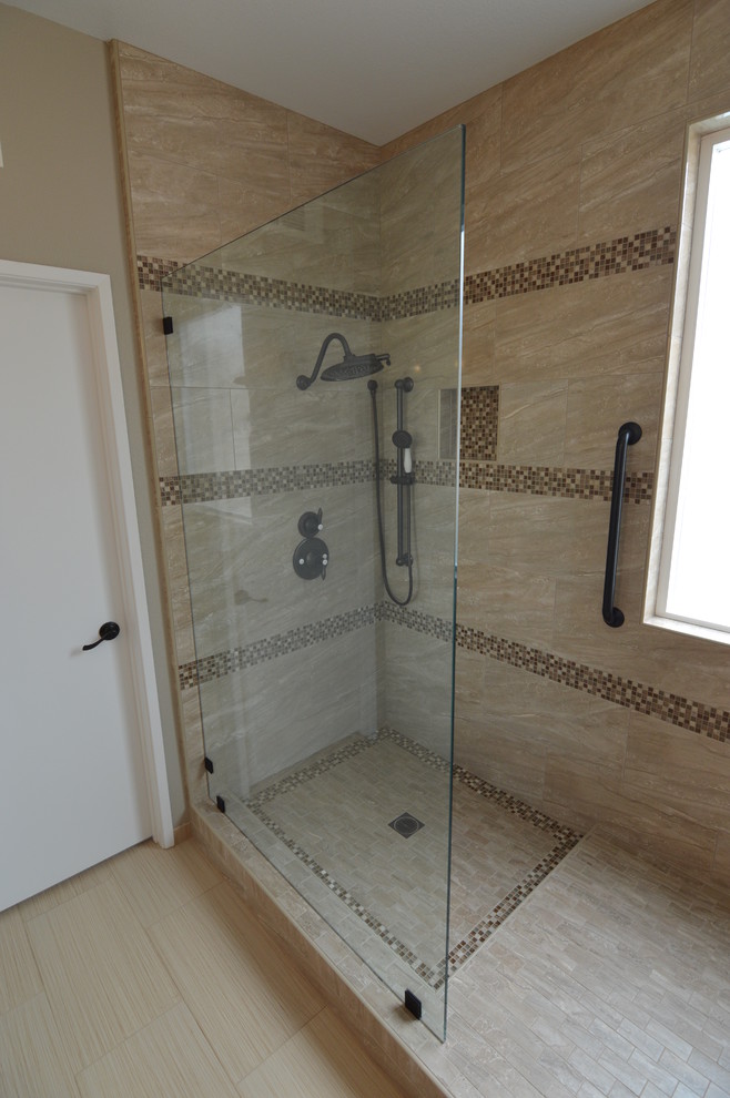 Photo of a medium sized mediterranean shower room bathroom in Los Angeles with raised-panel cabinets, white cabinets, an alcove shower, a two-piece toilet, beige tiles, porcelain tiles, beige walls, porcelain flooring, a built-in sink, quartz worktops, beige floors and an open shower.