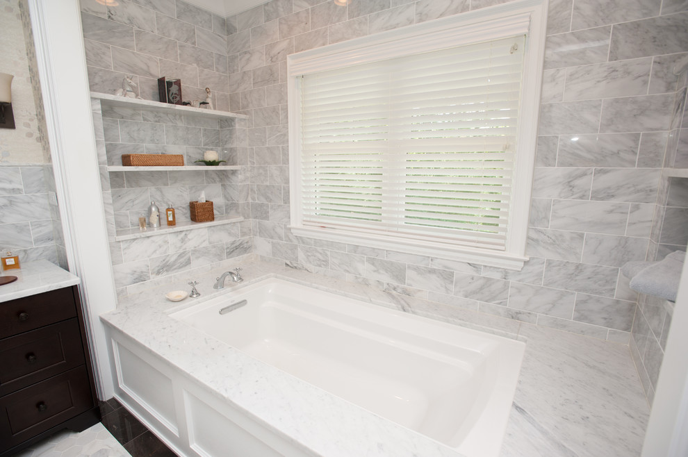 Photo of a traditional bathroom in Milwaukee with grey tiles and marble tiles.