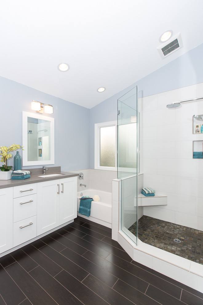 Design ideas for a medium sized contemporary ensuite bathroom in Orange County with a submerged sink, shaker cabinets, white cabinets, engineered stone worktops, a corner shower, a two-piece toilet, grey tiles, porcelain tiles, blue walls, porcelain flooring and an alcove bath.