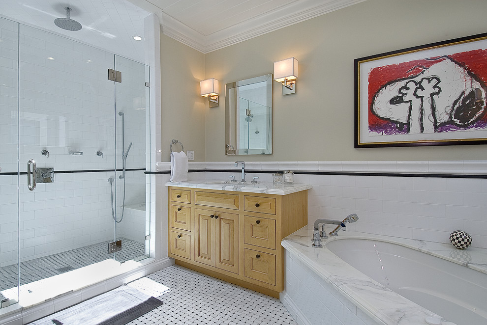 Example of a classic alcove bathtub design in San Francisco with an undermount sink and white countertops