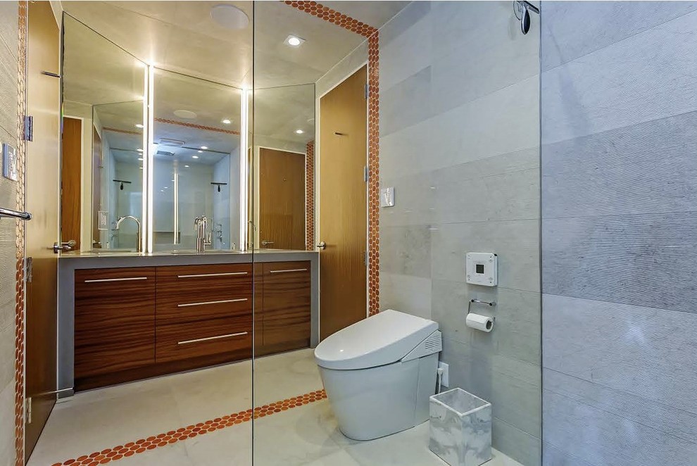 Contemporary bathroom in Toronto with flat-panel cabinets, medium wood cabinets, an alcove shower, a one-piece toilet, grey tiles, grey walls, marble flooring, beige floors and a hinged door.
