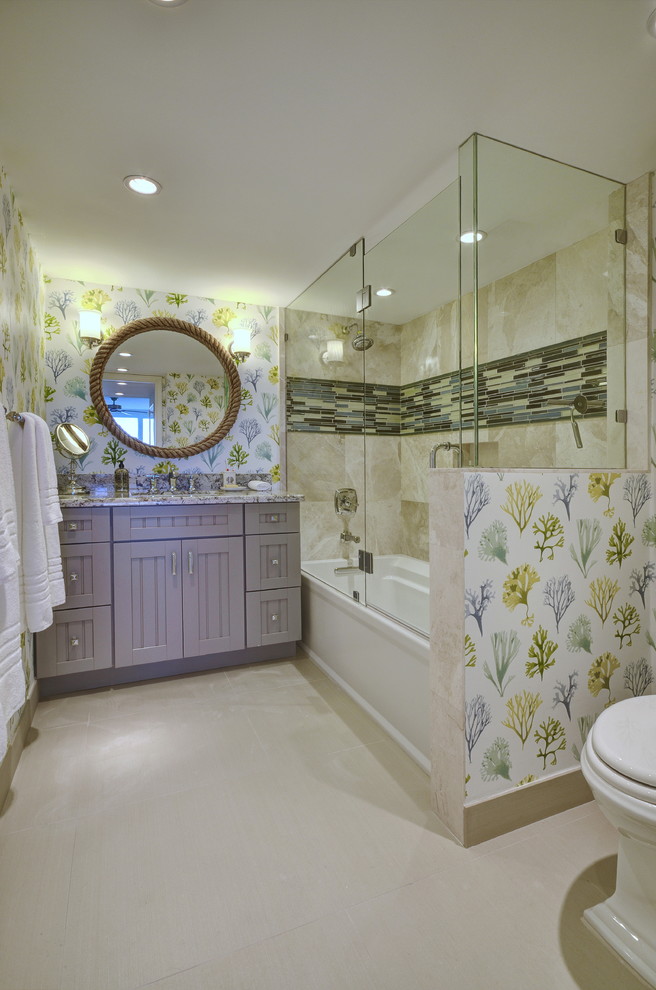 Example of a small beach style master multicolored tile and stone tile porcelain tile bathroom design in Miami with shaker cabinets, gray cabinets, a two-piece toilet, multicolored walls, an undermount sink and granite countertops