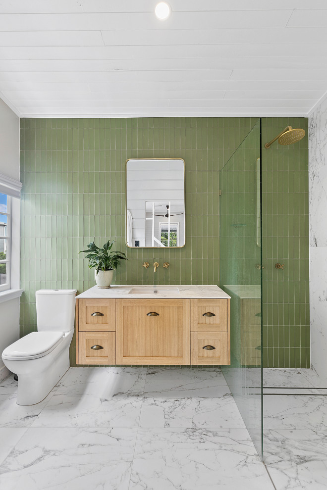 Example of a large transitional 3/4 green tile porcelain tile, gray floor, single-sink and shiplap ceiling bathroom design in Brisbane with light wood cabinets, an undermount sink, marble countertops, white countertops, shaker cabinets, gray walls and a floating vanity