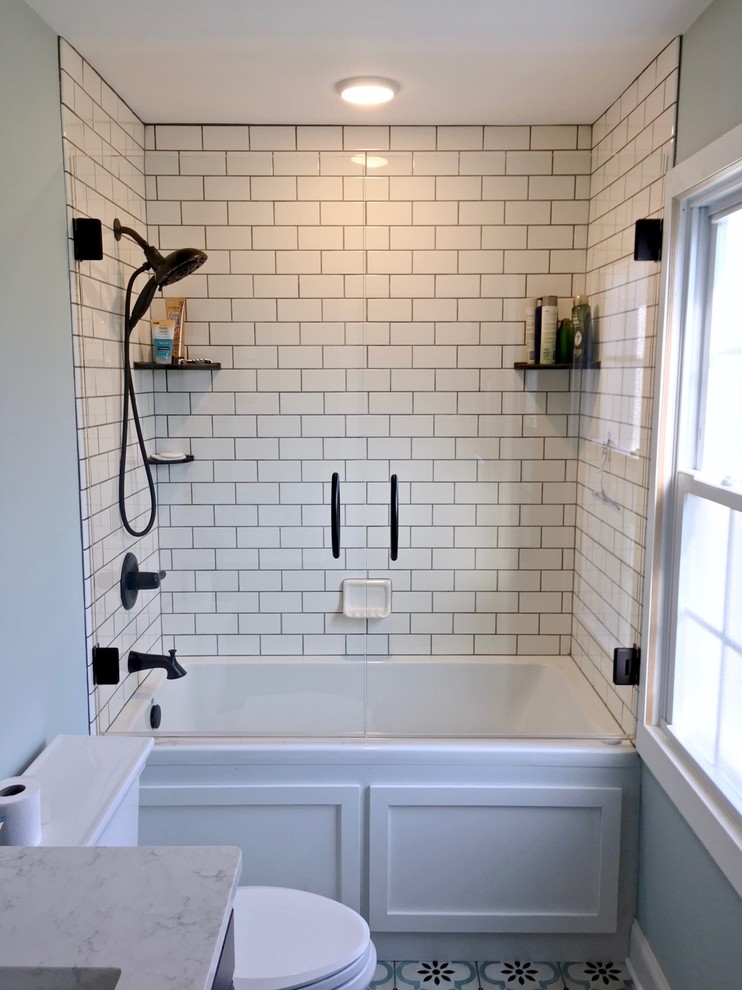 This is an example of a medium sized mediterranean family bathroom in Other with an alcove shower, white tiles, metro tiles and a hinged door.