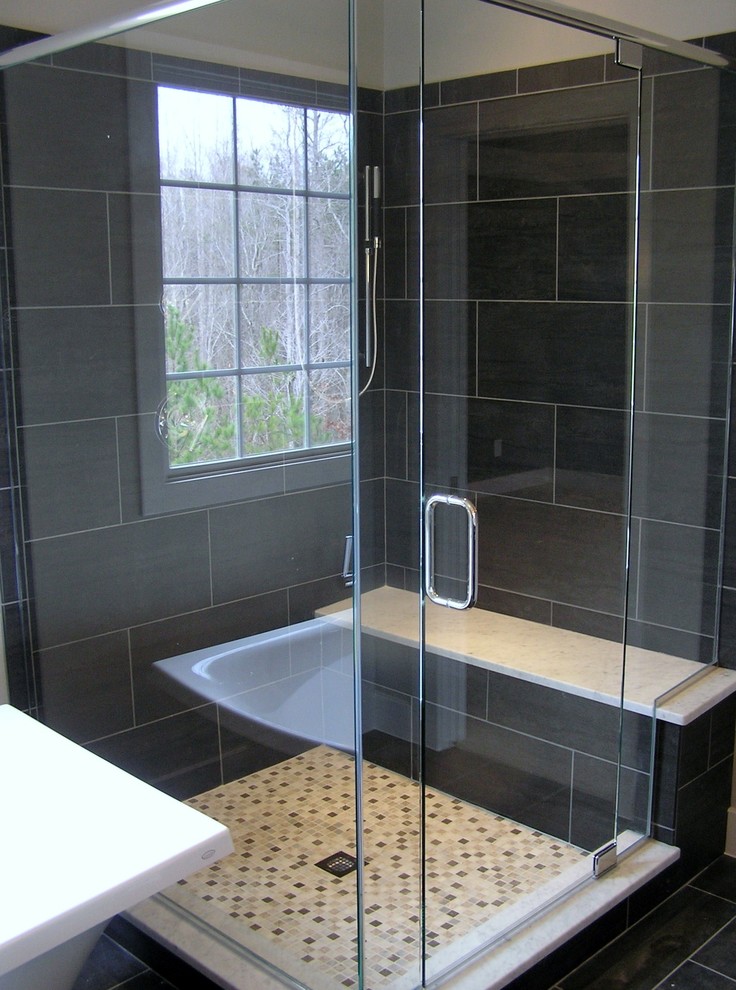 Photo of a medium sized classic shower room bathroom in Raleigh with raised-panel cabinets, black cabinets, a built-in bath, a walk-in shower, a one-piece toilet, black tiles, ceramic tiles, beige walls, ceramic flooring, a built-in sink and granite worktops.