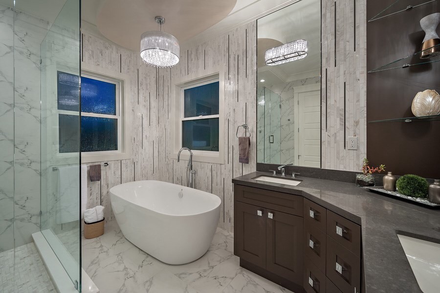 Mid-sized trendy master white tile and porcelain tile porcelain tile bathroom photo in Vancouver with shaker cabinets, brown cabinets, a one-piece toilet, white walls, an undermount sink and quartzite countertops