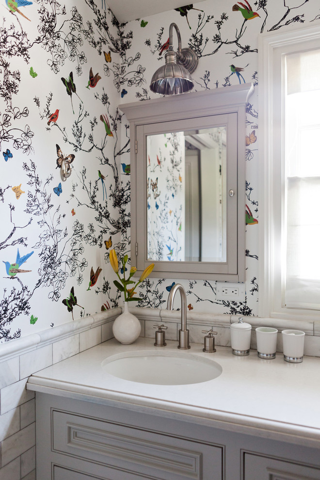 Inspiration for a transitional bathroom remodel in Los Angeles with multicolored walls and beaded inset cabinets