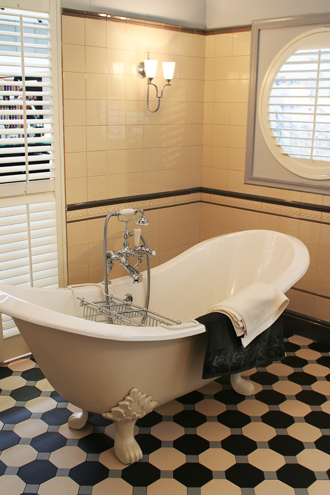 This is an example of a large victorian ensuite bathroom in Other.