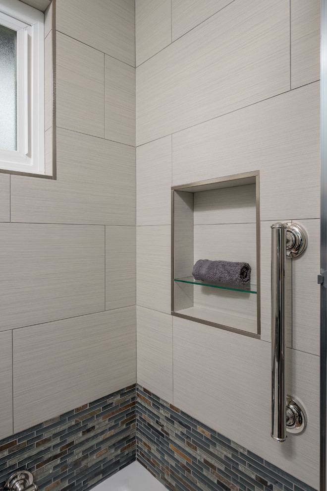 Inspiration for a mid-sized contemporary kids' gray tile and porcelain tile porcelain tile bathroom remodel in San Francisco with recessed-panel cabinets, blue cabinets, a two-piece toilet, blue walls, an undermount sink and quartz countertops