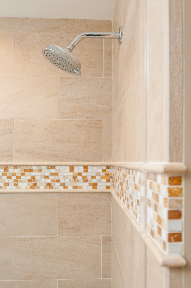 Mid-sized arts and crafts 3/4 beige tile and porcelain tile porcelain tile and beige floor bathroom photo in San Francisco with an undermount sink, light wood cabinets, quartzite countertops, a one-piece toilet, beige walls, recessed-panel cabinets and a hinged shower door